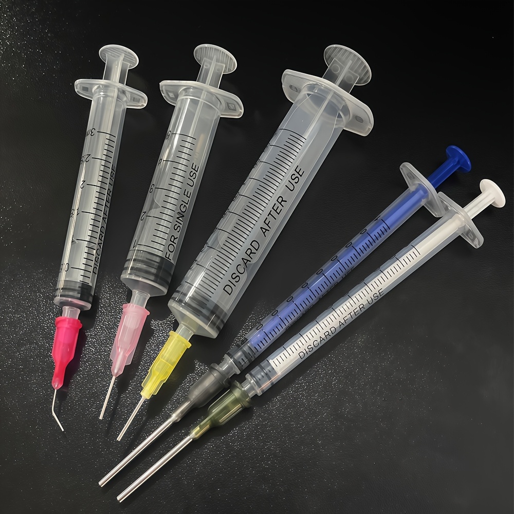 Lab Equipment - A Set of Precision Laboratory Syringes